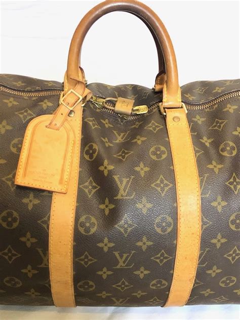 louis vuitton 55 duffle bag ebay|More.